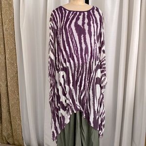 Animal print poncho with sleeves basic attached.